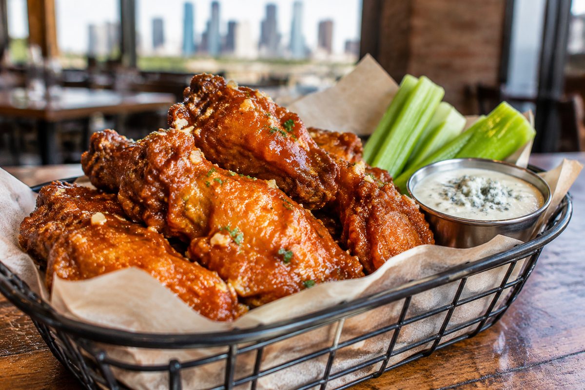 Crispy tavern chicken wings tossed in garlic buffalo glaze